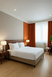 Custom Terracotta Blackout Drapes. Boutique Hotel Collection. Fire-Rated & Safety Certified.
