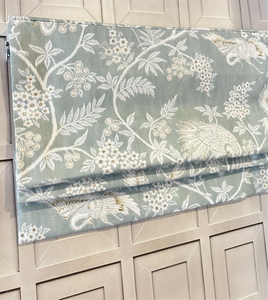 Custom roman shades in light blue cotton canvas with floral and bird pattern handmade in Canada