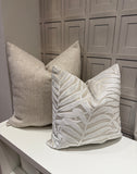 Decorative pillows on a bed with a geometric headboard. Textured botanical velvet upholstery fabric heavy weight designer fabric.
Taupe color with ivory velvet