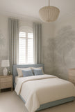 Neatly made bed in a bedroom with neutral tones and decorative elements.Light blue Nursery Drapes
