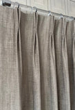 Custom Brenta chenille herringbone drapery in a soft taupe color with elegant pleats, luxury made-to-measure window treatments for modern homes.