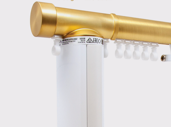 Gold curtain rod with white Somfy motor.Motorized rod.motorized channel drapery hardware
